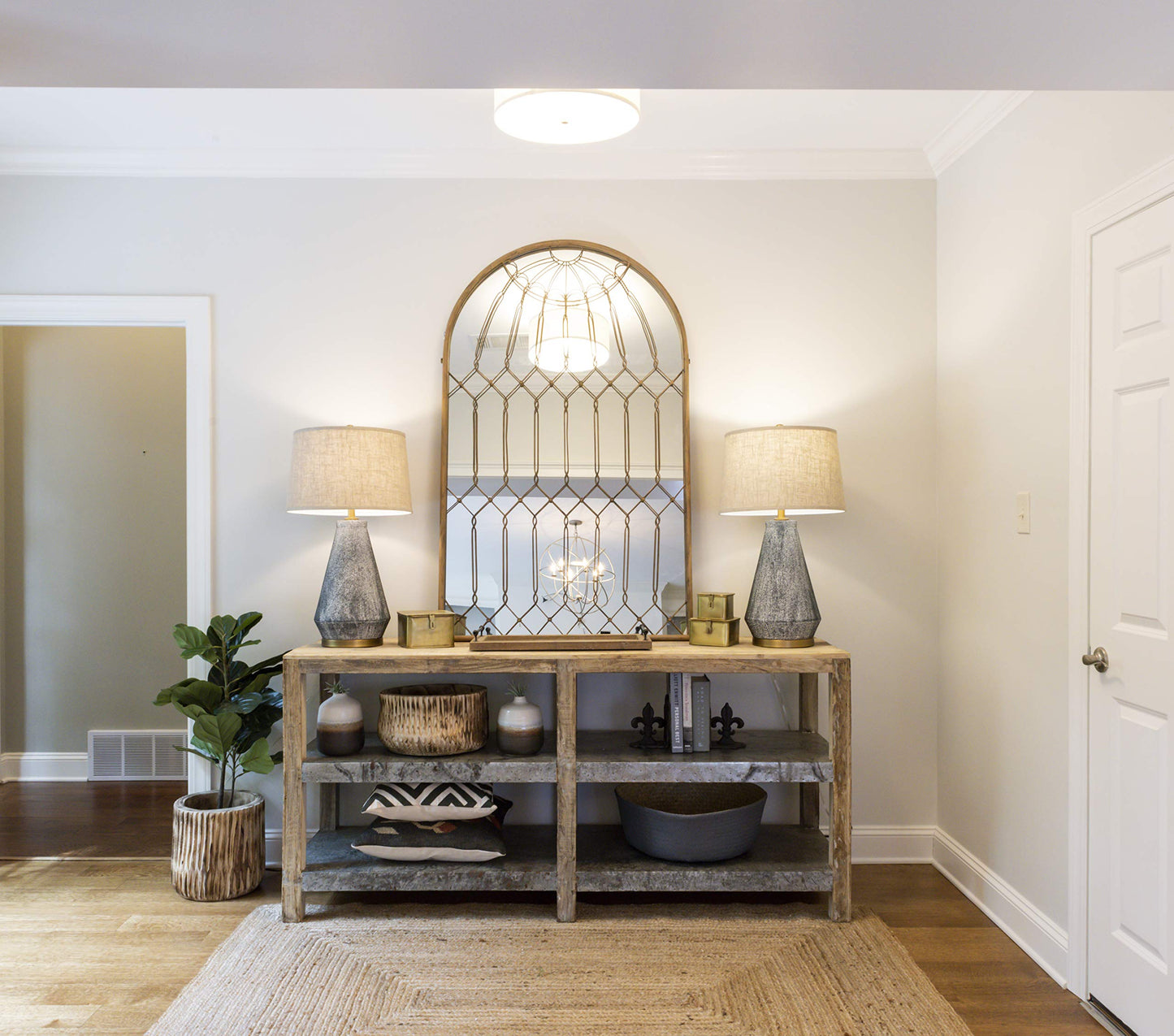 Creative Co-Op Arched Mirror with Iron Cage Design